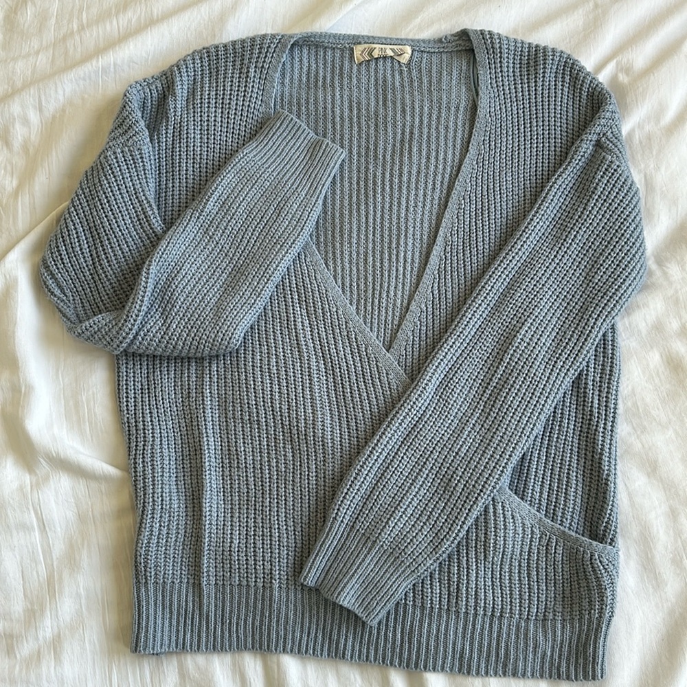 Light blue knitted sweater